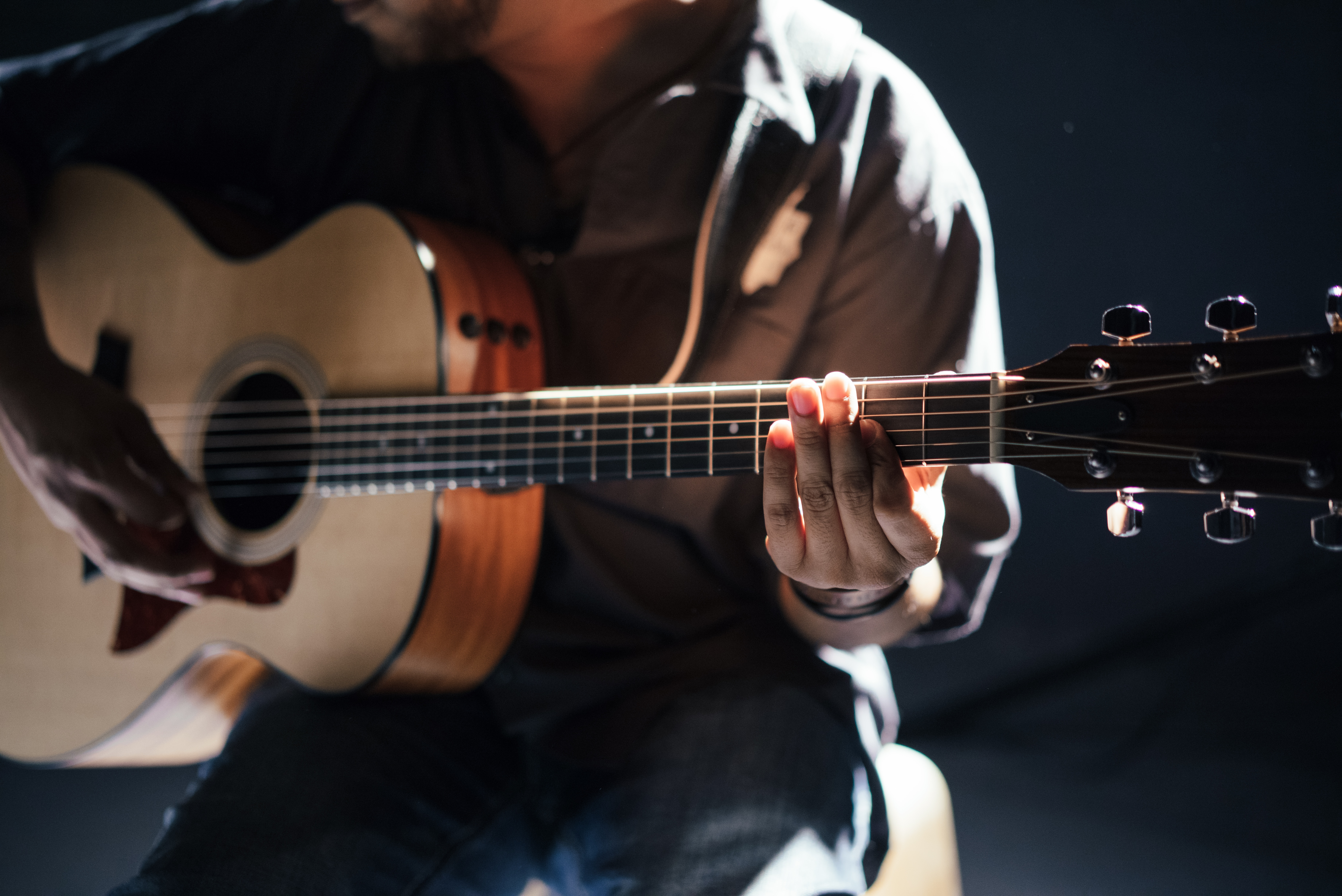 man playing the guitar